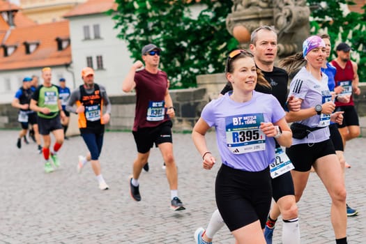 Prague, Czechia - 7th May 2023 - Runners of Prague Half marathon in the city streets.