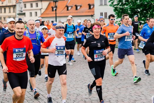 Prague, Czechia - 7th May 2023 - Runners of Prague Half marathon in the city streets.