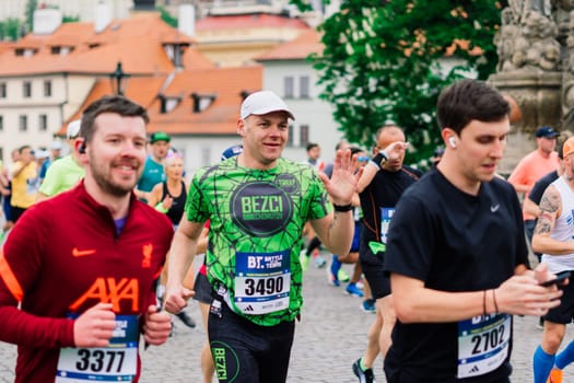 Prague, Czechia - 7th May 2023 - Runners of Prague Half marathon in the city streets.