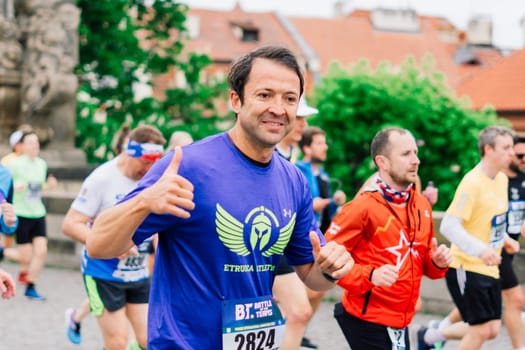 Prague, Czechia - 7th May 2023 - Runners of Prague Half marathon in the city streets.