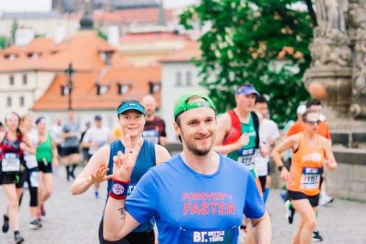 Prague, Czechia - 7th May 2023 - Runners of Prague Half marathon in the city streets.