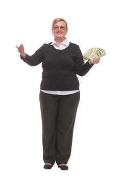 Mature lady holding a bunch of 100-dollar bills with happy facial expression and smiling at camera