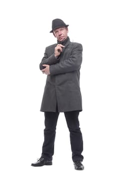 in full growth. intelligent man in a hat and autumn coat. isolated on a white background.