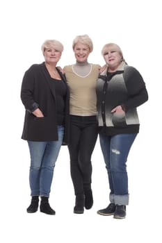 in full growth. three happy women standing together. isolated on a white background.
