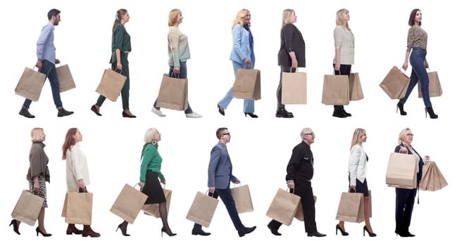 a group of people stand in line with shopping bags. isolated on white