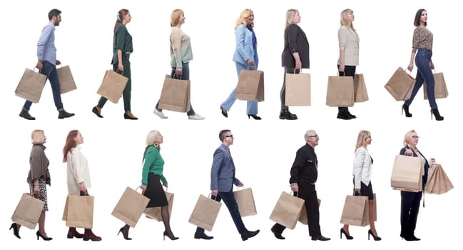 a group of people stand in line with shopping bags. isolated on white