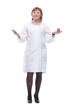 in full growth. medical woman with a laboratory flask . isolated on a white background.