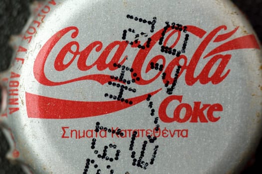 Tyumen, Russia-February 15, 2023: Vintage Coca Cola bottle cap. 1995 design, close-up selective focus