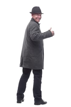 in full growth. intelligent man in a hat and autumn coat. isolated on a white background.