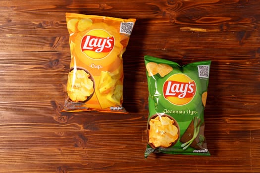 Tyumen, Russia-January 06, 2023: Lays a popular brand of potato chips close up. Lays is one of the most famous brands of chips in the world