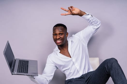 Happy african american young businessman in a formal suit. Smiling confident black guy