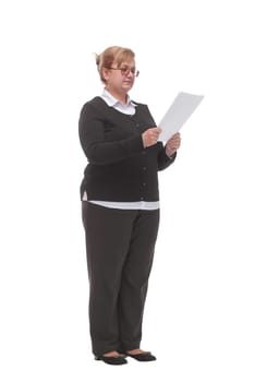 Side view of serious mature woman reading documents. Isolated white background