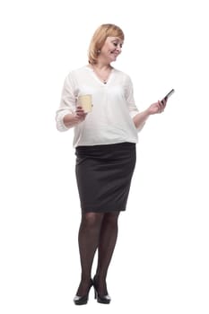 business woman with smartphone and coffee to take away. isolated on a white background.