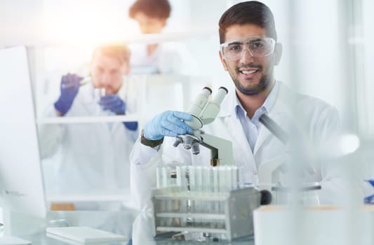 Focused male scientist working in laboratory