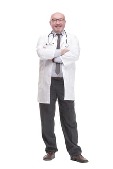 in full growth. successful mature doctor in a white coat .isolated on a white background
