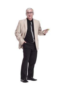 in full growth. happy intelligent man with banknotes. isolated on a white background.