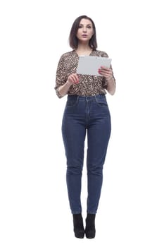in full growth. attractive young woman with a digital tablet. isolated on a white background.