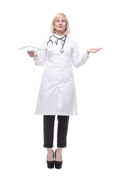 in full growth. qualified female doctor with a digital tablet. isolated on a white background.