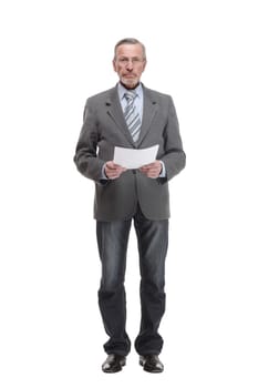 Full length portrait of a mature businessman looking at documents isolated on white background