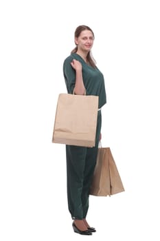 Young woman with shopping packages isolated on white. Happy shopping concept