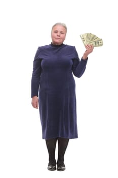 Portrait of smiling old woman holding money in hand on white background