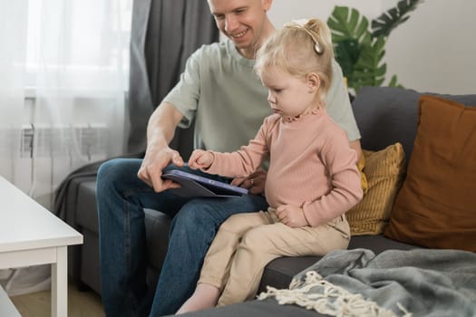 Deaf kid with hearing aid cochlear implant have fun with parents - Hear aid and medicine innovating technology and diversity