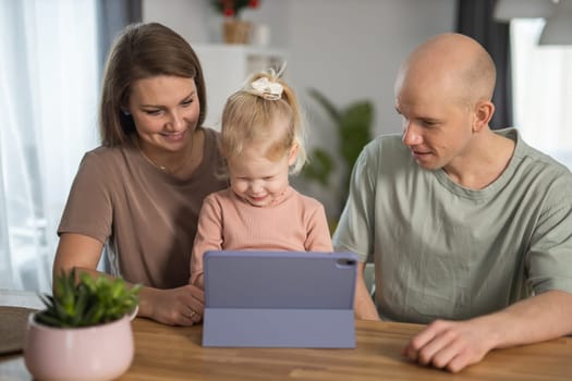 Deaf kid with hearing aid cochlear implant have fun with parents - Hear aid and medicine innovating technology and diversity