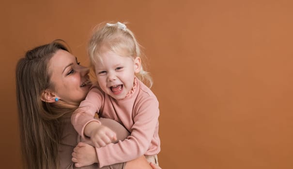 Deaf child girl with cochlear implant studying to hear sounds - recovery after cochlear Implant surgery and rehabilitation