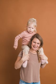 Deaf child girl with cochlear implant studying to hear sounds - recovery after cochlear Implant surgery and rehabilitation