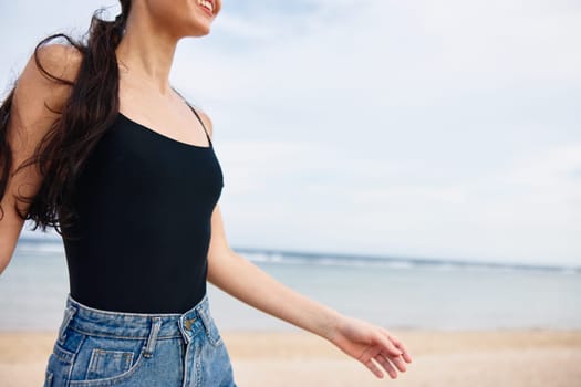 young woman smile lifestyle flight beauty positive relax beach girl fun travel summer sunset sea running ocean female happy active nature