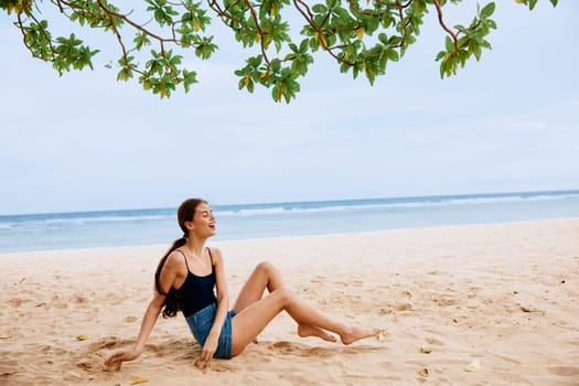 woman summer vacation female alone hair adult travel nature beach sand smile tropical relax sea beauty person bali freedom sexy sitting
