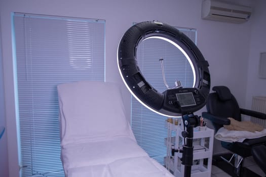 circular neon LED lamp in a beauty salon, Popular modern light for make-up and beauty care. High quality photo