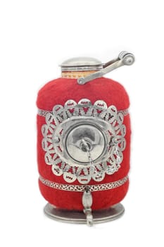Samovar with a red felt isolated on a white background