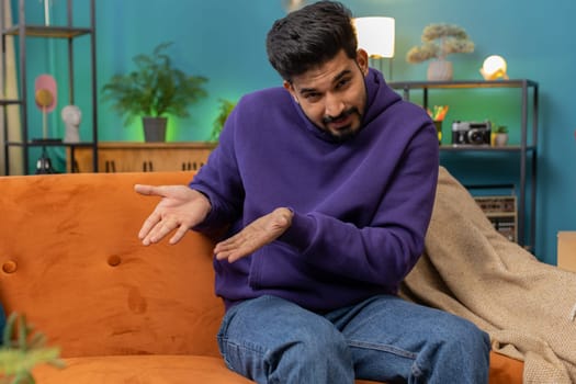 Indian man raising hands asking what why reason of failure, disbelief irritation by troubles, trendy social media meme, anti lifehacks, ridicules people who complicate simple tasks for no reason, home