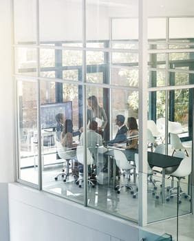 Presentation, meeting and business people in office for planning, discussion and problem solving. Finance, collaboration and woman leader with team in a boardroom for sharing vision, growth and idea.