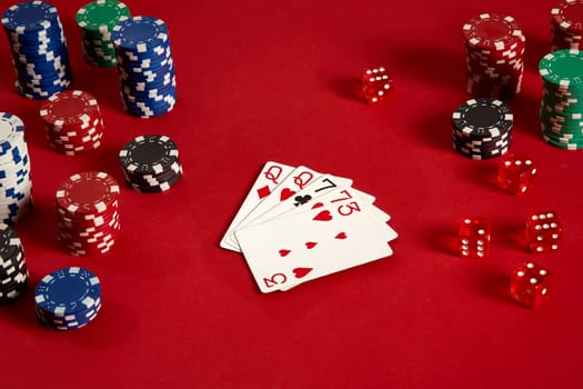 Poker cards and gambling chips on red background. Top view. Copy space. Still life. Flat lay. 2 Pair