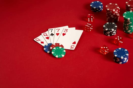Poker cards and gambling chips on red background. Top view. Copy space. Still life. Flat lay. 2 Pair