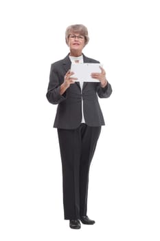 Adult female in black suit holding business papers in her hand, isolated on white background