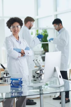 Scientists smiling together in lab