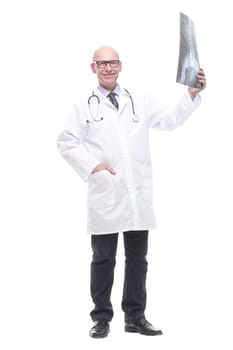 senior doctor with a stethoscope looking at an x-ray. isolated on a white background.