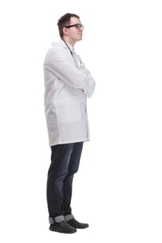 Young doctor man wearing white coat and stethoscope with smile on face, pointing with hand and finger to the side