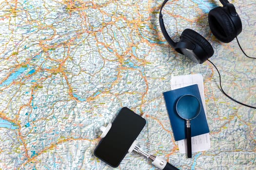 Travel plan, trip vacation accessories for trip, tourism mockup - Outfit of traveler on map background. Flat lay and copyspace. Still life