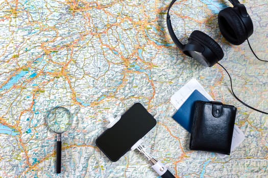 Travel plan, trip vacation accessories for trip, tourism mockup - Outfit of traveler on map background. Flat lay and copyspace. Still life