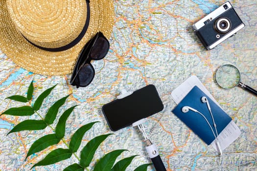 Travel plan, trip vacation accessories for trip, tourism mockup - Outfit of traveler on map background. Flat lay and copyspace. Still life