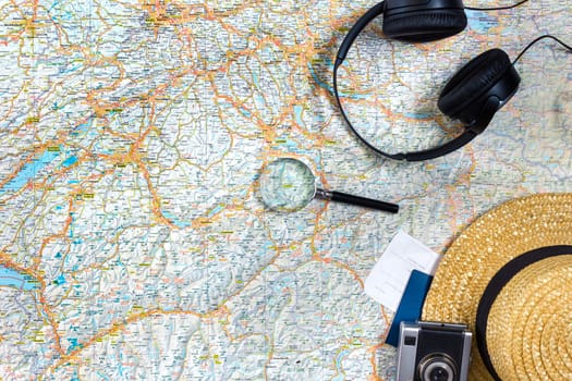 Travel plan, trip vacation accessories for trip, tourism mockup - Outfit of traveler on map background. Flat lay and copyspace. Still life
