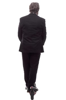 rear view. a business man with an electric scooter reads an ad. isolated on a white