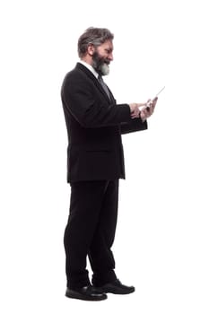 side view. business man and using a digital tablet. isolated on a white