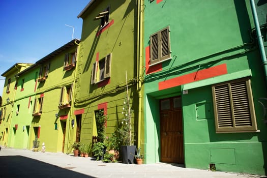 Photographic documentation of the colored houses in Ghizzano Pisa Italy 