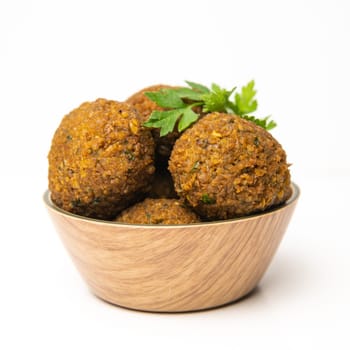 Whole and half falafel isolated on a white background closeup, High quality photo