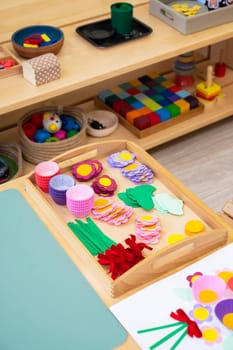 Classroom of Montessori kindergarten. The colorful Montessori material. Concept of children learning toy